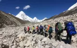 Porter carry backpack heading to Everest base camp