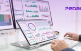 Person analyzing driving school automation and training analytics on laptop and monitor dashboards with Pedal Mobility software interface