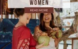 Colombian women smiling at each other